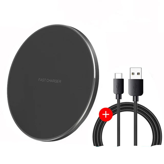 Black wireless charger pad with USB cable on a white background